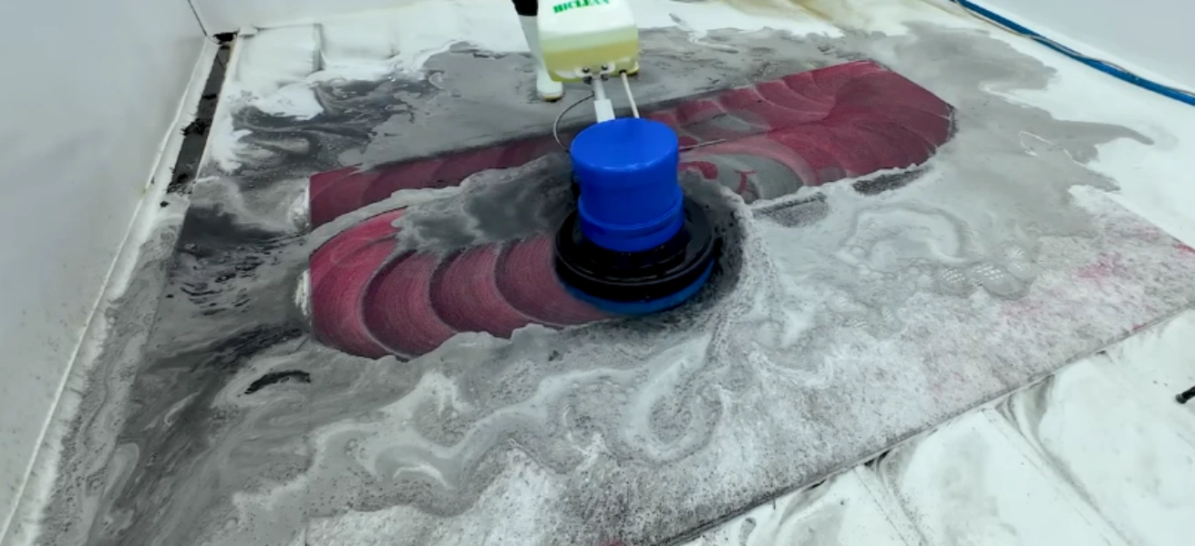 PureNest technician cleaning a rug in progress in Medford, OR